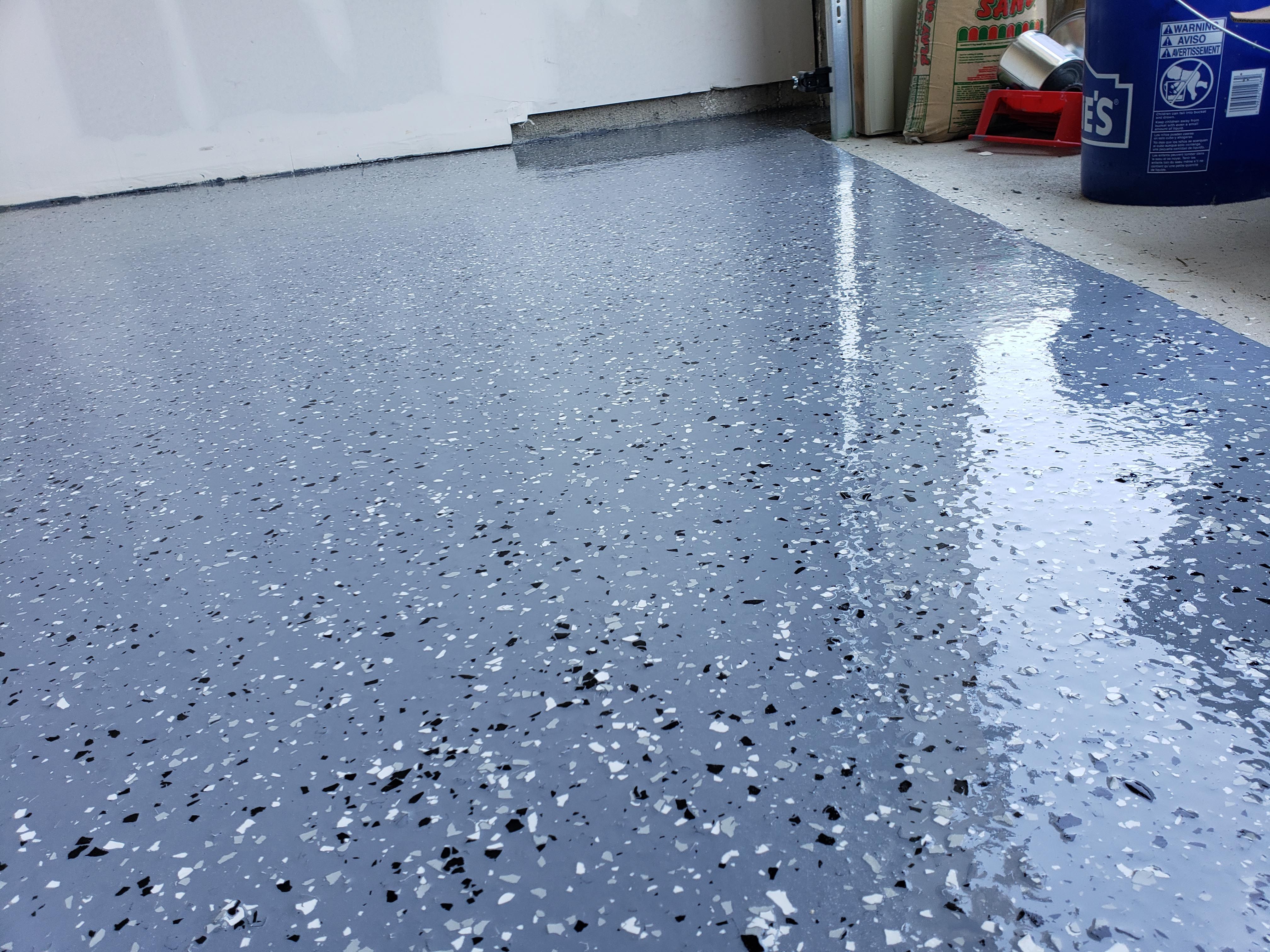 Close-up of a decorative flake garage floor finish